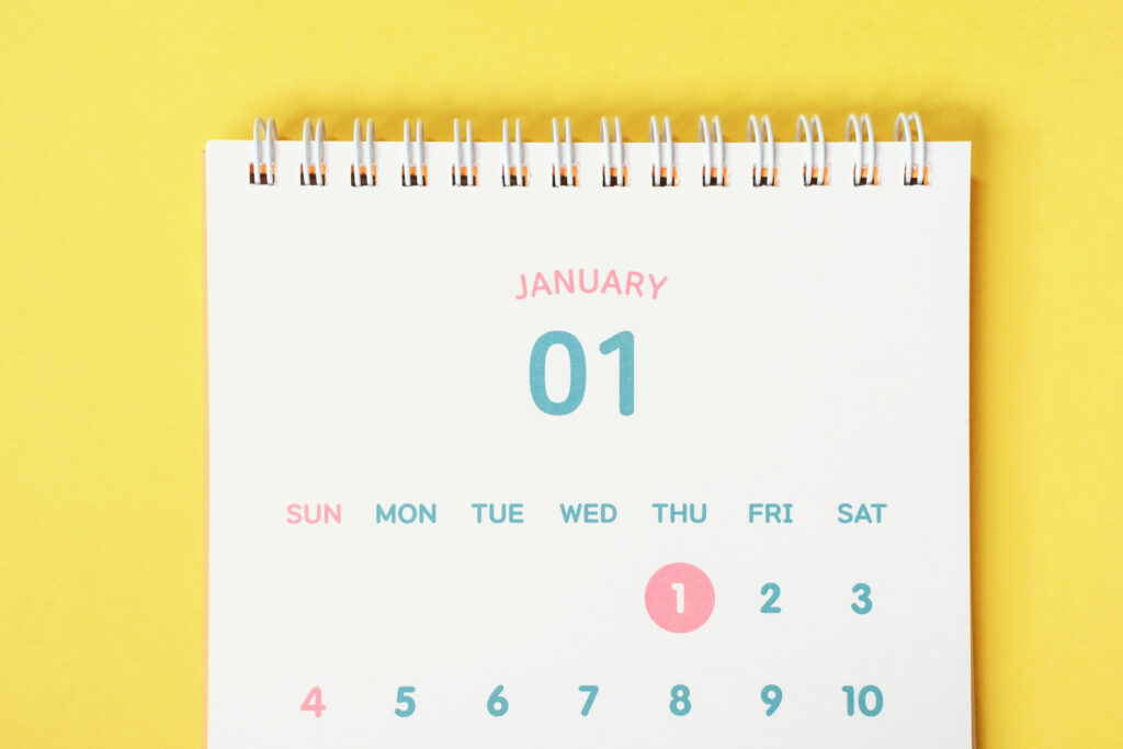 A calendar showing Jan 1st on a yellow background 